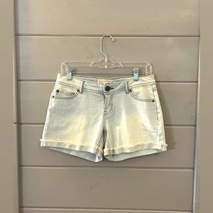 Light wash cut off Jean shorts size 4 detailed distressed stars‎ on back